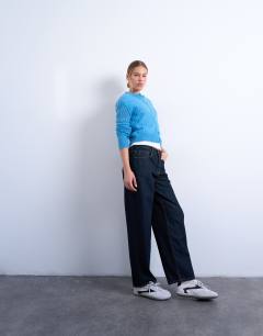 Model wearing Knitted pointelle cardigan in blue