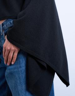 Model wearing Knitted poncho in black