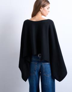Model wearing Knitted poncho in black