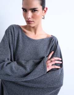 Model wearing Knitted poncho in charcoal