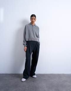 Model wearing Knitted premium 100% lambswool polo jumper in grey