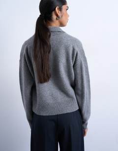 Model wearing Knitted premium 100% lambswool polo jumper in grey