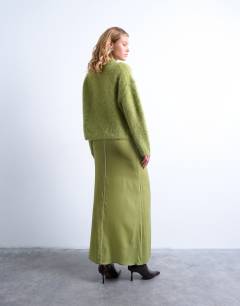 Model wearing Knitted premium alpaca crew neck boxy jumper in green