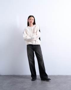 Model wearing Knitted premium chunky cable colour block cardigan in mono