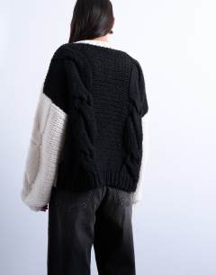 Model wearing Knitted premium chunky cable colour block cardigan in mono