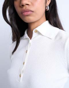 Model wearing Knitted rib collar polo in ivory