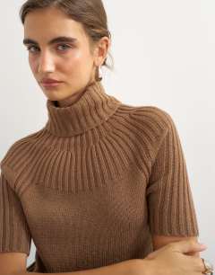 Model wearing Knitted rib yoke funnel neck top in gingerbread
