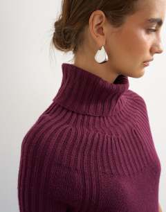 Model wearing Knitted rib yoke funnel neck top in mulberry