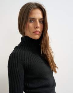 Model wearing Knitted rib yoke long sleeve top in black