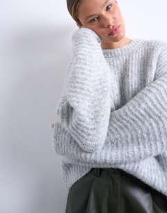 Model wearing Knitted ribbed balloon sleeve jumper in grey