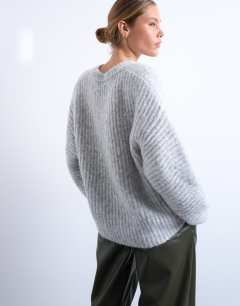 Model wearing Knitted ribbed balloon sleeve jumper in grey