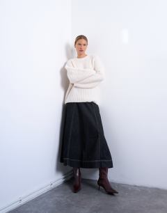 Model wearing Knitted ribbed balloon sleeve jumper in ivory