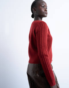Model wearing Knitted ribbed button crew cardigan in red