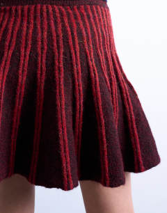 Model wearing Knitted ribbed co-ord mini skirt in burgundy