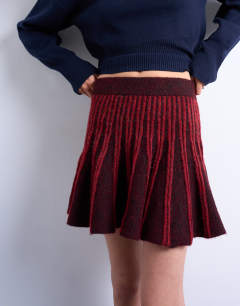 Model wearing Knitted ribbed co-ord mini skirt in burgundy