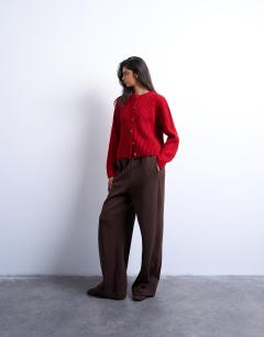 Model wearing Knitted ribbed crew relaxed button cardigan in red