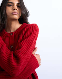 Model wearing Knitted ribbed crew relaxed button cardigan in red
