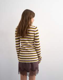 Model wearing Knitted ribbed stripe button cardigan in multi