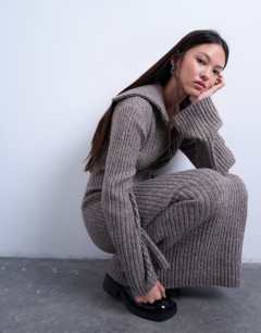 Model wearing Knitted ring zip midi dress in brown