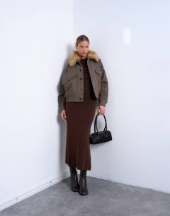 Model wearing Knitted ruffle button asymetric dress in chocolate