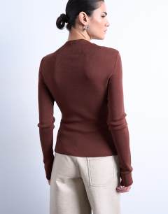 Model wearing Knitted ruffle button top in chocolate