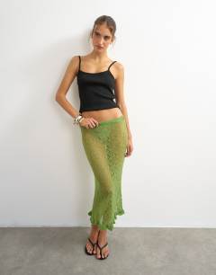 Model wearing Knitted ruffle hem pointelle midi skirt with wool in green