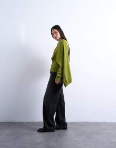 Model wearing Knitted scarf jumper in olive green
