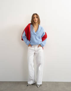 Model wearing Knitted shawl collar jumper with wool in blue