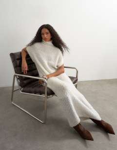 Model wearing Knitted sheer funnel neck maxi dress with wool in ivory