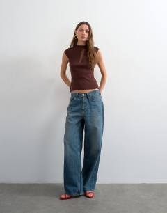 Model wearing Knitted sheer mix cap sleeve top in chocolate