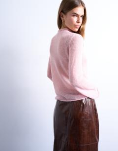Model wearing Knitted sheer roll neck top in light pink