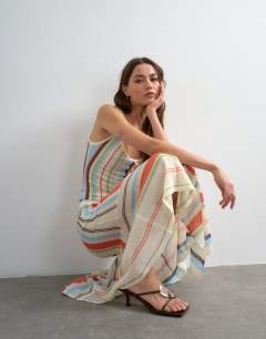 Model wearing Knitted sheer stripe full skirt co-ord in multi