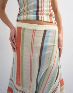 Model wearing Knitted sheer stripe full skirt co-ord in multi