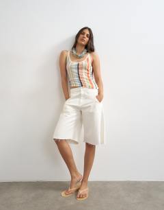 Model wearing Knitted sheer stripe vest co-ord in multi
