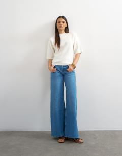 Model wearing Knitted short sleeve lace back detail jumper in ivory