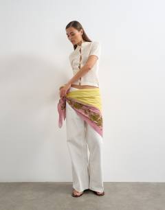 Model wearing Knitted short sleeve mandarin collar cardigan in ivory