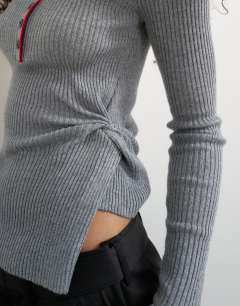 Model wearing Knitted side twist polo with wool in grey