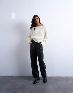 Model wearing Knitted slash neck jumper in ivory