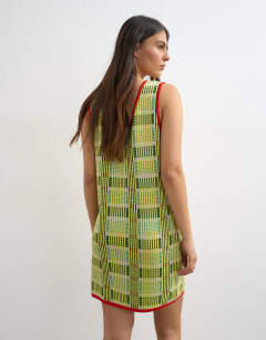 Model wearing Knitted sleeveless check mini dress in green