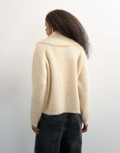 Model wearing Knitted slouchy button front shawl collared cardigan in latte