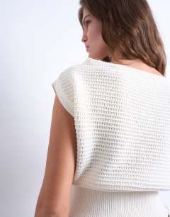 Model wearing Knitted stitchy one shoulder top in cream