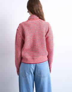 Model wearing Knitted stripe cardigan and scarf in red and white