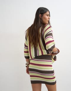 Model wearing Knitted stripe co-ord mini skirt in multi