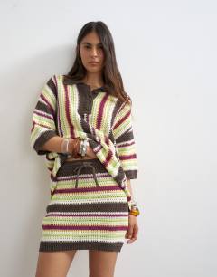Model wearing Knitted stripe co-ord mini skirt in multi