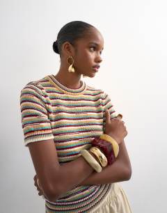 Model wearing Knitted stripe co-ord top in multi