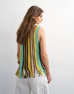Model wearing Knitted stripe fringe top in yellow and brown