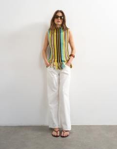 Model wearing Knitted stripe fringe top in yellow and brown
