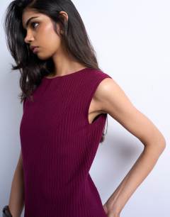 Model wearing Knitted stripe full skirt dress in burgundy