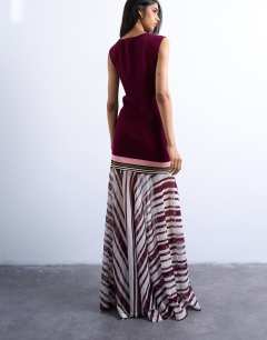 Model wearing Knitted stripe full skirt dress in burgundy