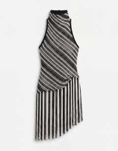 Model wearing Knitted stripe halterneck longline fringing tunic in black and white